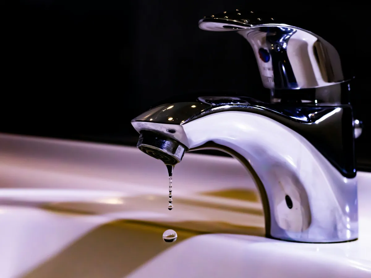 Close-up of a chrome single-lever basin faucet